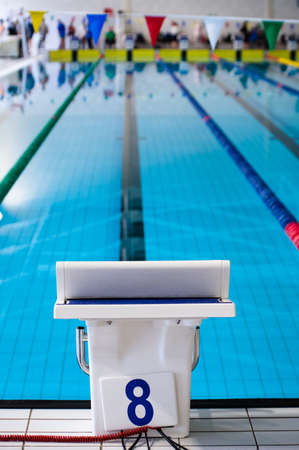 Aligned swimming starting block and platform with numberの写真素材