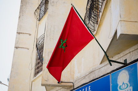 Red flag of Morocco waving in the wind background outsideの写真素材