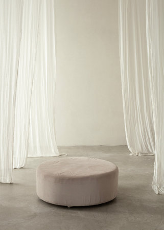 spacious interior with a round pedestal in the centerの写真素材