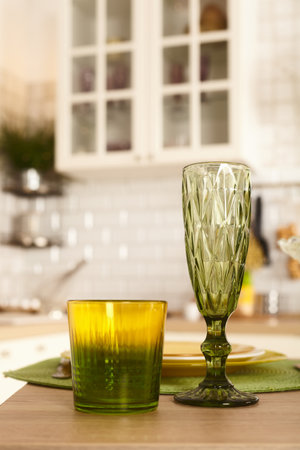 glassware on the kitchen table in a bright interiorの写真素材