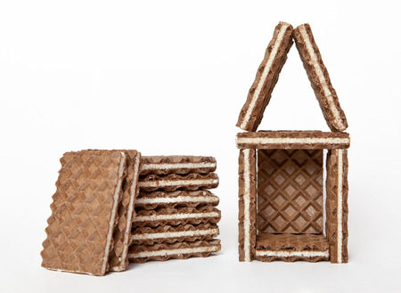 Sweet home of their chocolate waffle blocks on white backgroundの写真素材