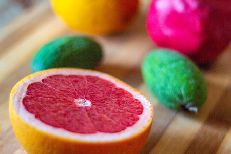 Fruit on a cutting board. Close-up. Cut grapefruit.の写真素材