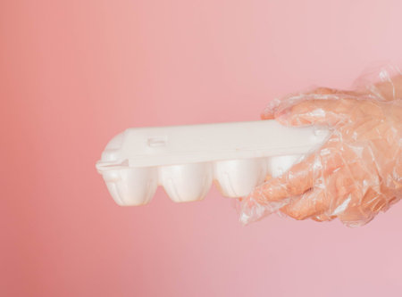 Delivery of food in disposable gloves.