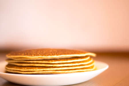 Small pancakes on a white plate.の写真素材