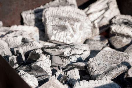 Extinguished coals close-up. Natural texture.の写真素材