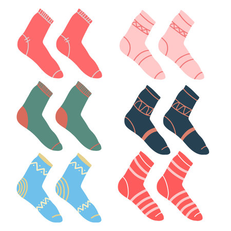 Socks vector illustration set. Knitted warm socks in different patterns. Six pairs of socks.のイラスト素材