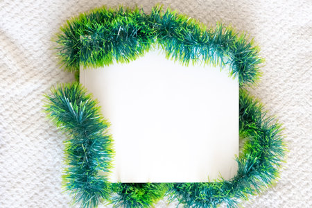 Mockup template.A book with a white cover in green tinsel.の写真素材
