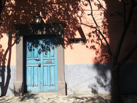 Old blue door in the city of San Miguel de Allende, Mexicoの写真素材