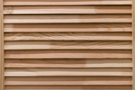 Blinds and natural wood backgroundの写真素材