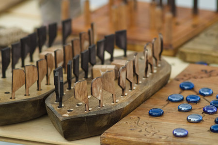 Medieval board games in the form of Viking rooks and checkers. Historical reconstruction of ancient traditions. Hobby.の写真素材