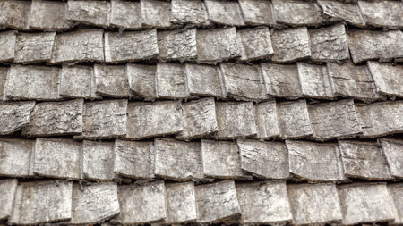 Traditional wooden roof tile of old house. Flat lay photo.の写真素材