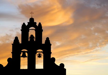 Mission Bell Tower Against a Sunset Sky (silhouette)の写真素材