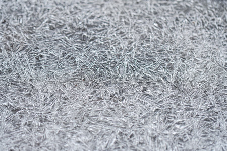 Closeup or macro of ice crystals of frozen water in winter season