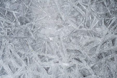 Closeup or macro of ice crystals of frozen water in winter season