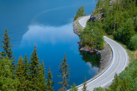Landscape photo of curvy road or street in beautiful nature, Norwayの写真素材