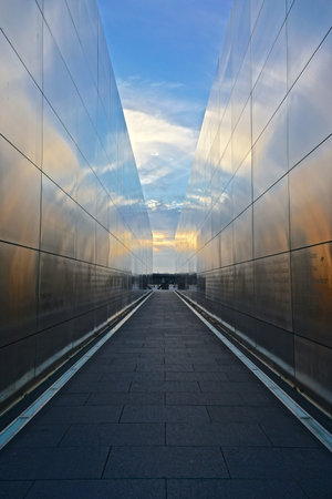 Jersey City, New Jersey: The glow of sunset shines through â€œEmpty Sky,â€ the official New...