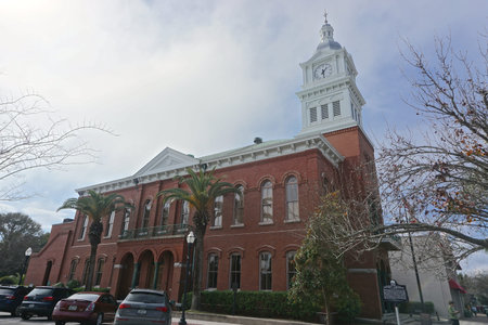 Fernandina Beach, FL, USA: The Classical Revival style Old Nassau County Courthouse (1891) Centre Street features cast-iron Corinthian columns and a bell tower and steeple.のeditorial素材