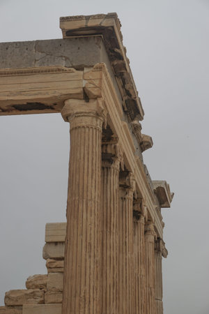 Athens, Greece: Detail of the Parthenon, 447-438 BCE, at the Acropolis of Athens, under a hazy sky...