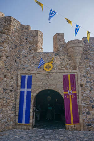 Monemvasia, Greece: Greek and Byzantine Empire flags at the entrance to the medieval fortress town of Monemvasia (founded in 583 AD).のeditorial素材