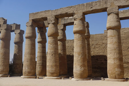 Luxor, Egypt: Columns covered with hieroglyphs at Luxor Temple, built in 1400 BC on the east bank of...