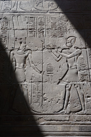 Luxor, Egypt: Carvings and hieroglyphs on a wall at Luxor Temple, built in 1400 BC on the east bank...