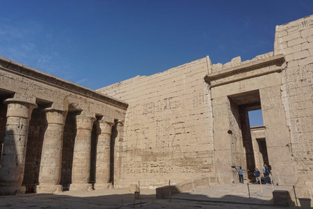 Luxor, Egypt: Corner of the peristyle courtyard at Medinet Habu, New Kingdom mortuary temple of...