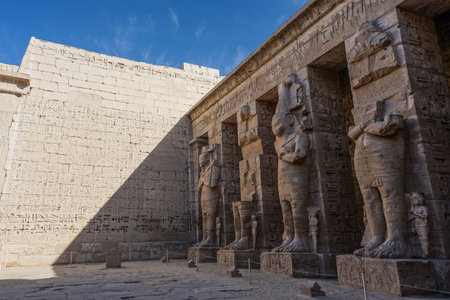 Luxor, Egypt: Corner of the peristyle courtyard at Medinet Habu, New Kingdom mortuary temple of...
