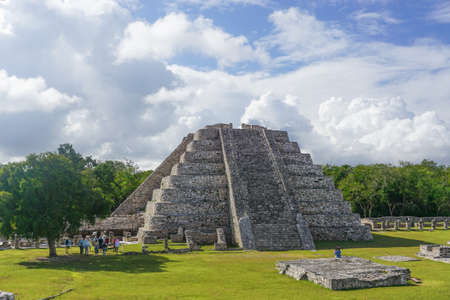 Mayapan, Mexico: Tourists visit the Mayan Temple of Kukulcan in Mayapan, the capital of the Maya in the YucatÃ¡n from the 1220s until the 1440s.のeditorial素材