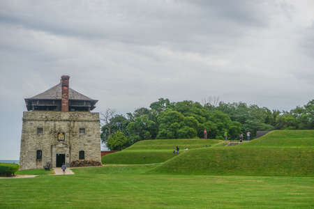 Porter, New York, USA: Visitors at the North Redoubt on the 23-acre grounds of Old Fort Niagara, on a cloudy day on Lake Ontario.のeditorial素材