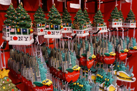 New York City, NY:  A large array of New York-themed holiday ornaments on display in a store.のeditorial素材