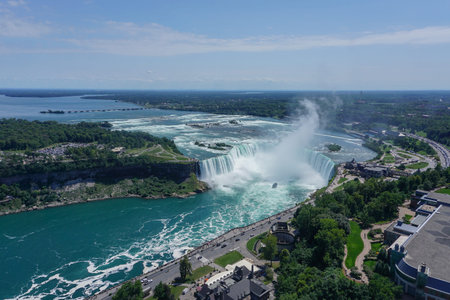 Niagara Falls, Ontario, Canada: Aerial view of tourists visiting the Niagara River, Niagara Gorge, Horseshoe Falls, and Table Rock.のeditorial素材