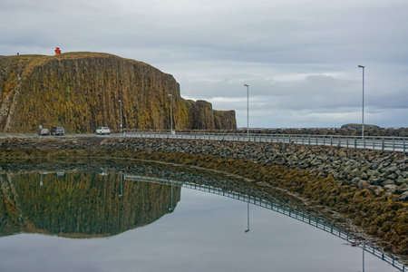 Stykkisholmur, Iceland: Causeway from the harbor of the fishing village to Sugandisey Island and its...