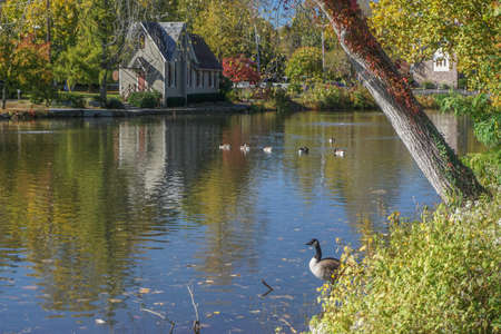 Yardley, PA: The Old Library by Lake Afton, completed in 1878. The building's style, known as "carpenter" Gothic, features a steep gable roof.のeditorial素材