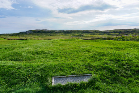 Newfoundland, Canada: A foundation marker at LâAnse-aux-Meadows (trans. Meadows Cove), the archeological site of a Norse settlement dating from 990 to 1050 CE.の写真素材