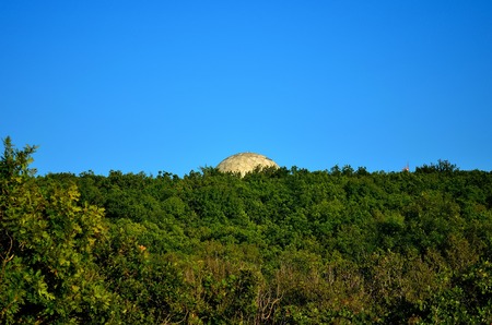The observatory on the top of the mountain against the blue skyの写真素材