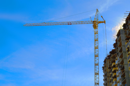 Tower crane at the construction of high-rise buildingの写真素材