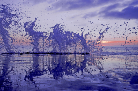 Splashing wave on the Black sea in the night.の写真素材