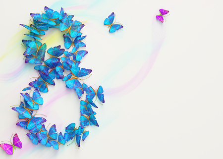 Womens day design, greeting card with March 8 and butterfliesの写真素材