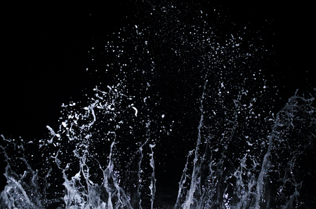 Splashing wave on the Black sea in the night.の写真素材