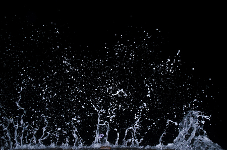 Splashing wave on the Black sea in the night.の写真素材