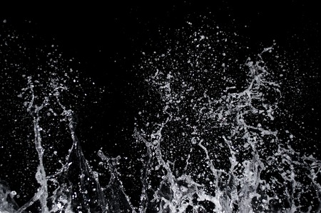 Splashing wave on the Black sea in the night.の写真素材