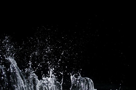 Splashing wave on the Black sea in the night.の写真素材