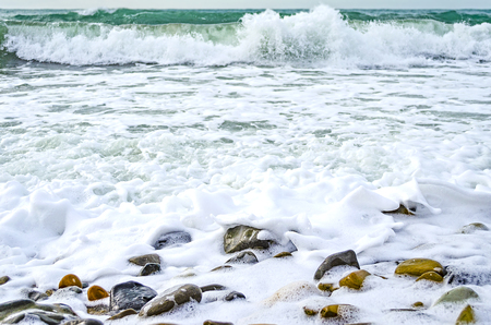 A strong wind rolls the waves to the shore on the Black sea.の写真素材