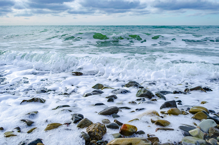 A strong wind rolls the waves to the shore on the Black sea.の写真素材