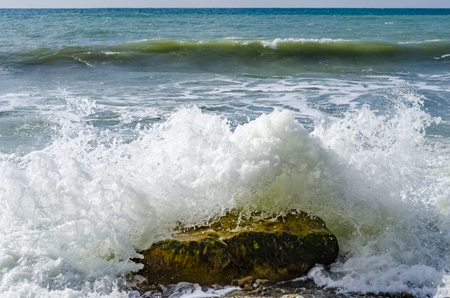 Splashing wave on the Black sea in the day.の写真素材
