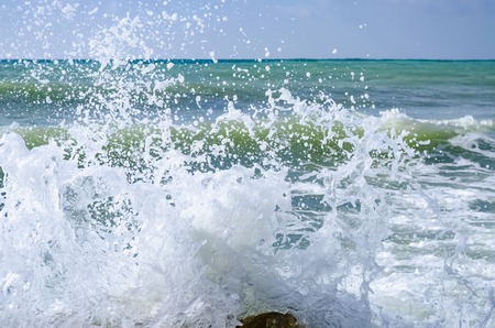 Splashing wave on the Black sea in the day.の写真素材