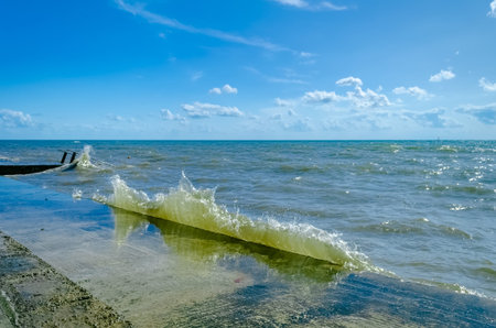 Splashing wave on the Black sea in the day.