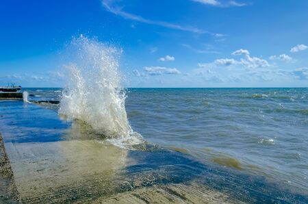 Splashing wave on the Black sea in the day.の写真素材