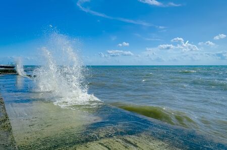 Splashing wave on the Black sea in the day.の写真素材