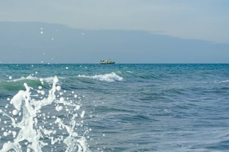 Splashing wave on the Black sea in the day.の写真素材